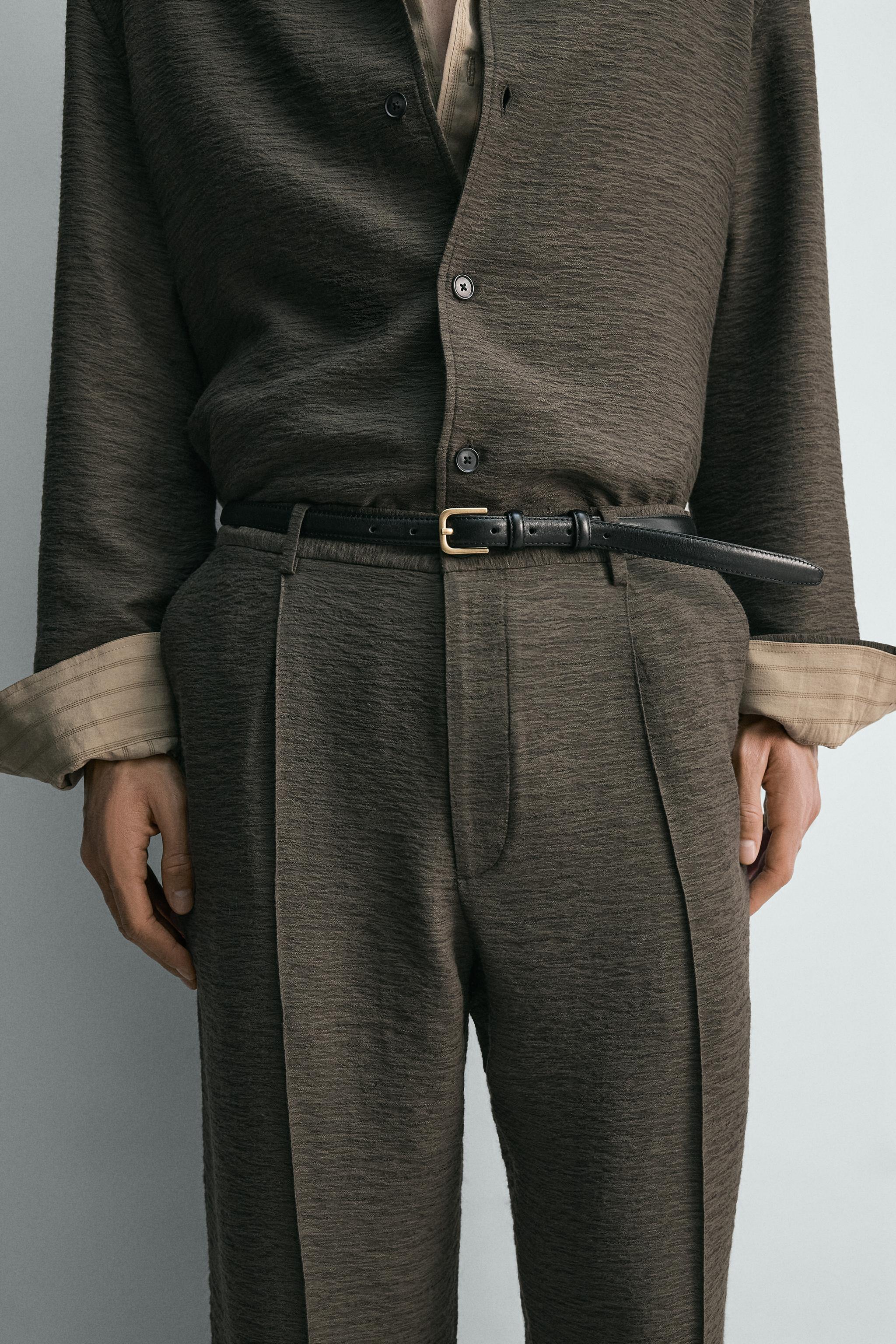 FLOWY TEXTURED PLEATED PANTS